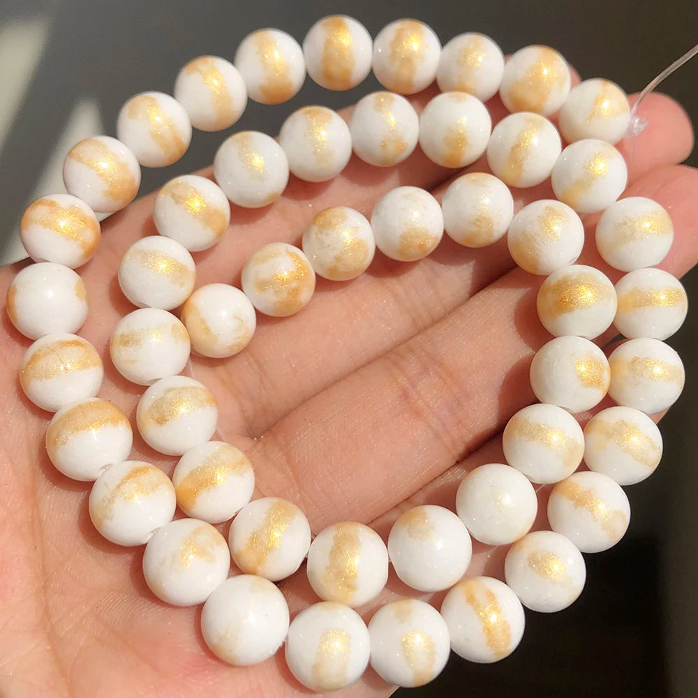 White Howlite Gold Plated Round Beads – 15" Strand 4–12mm