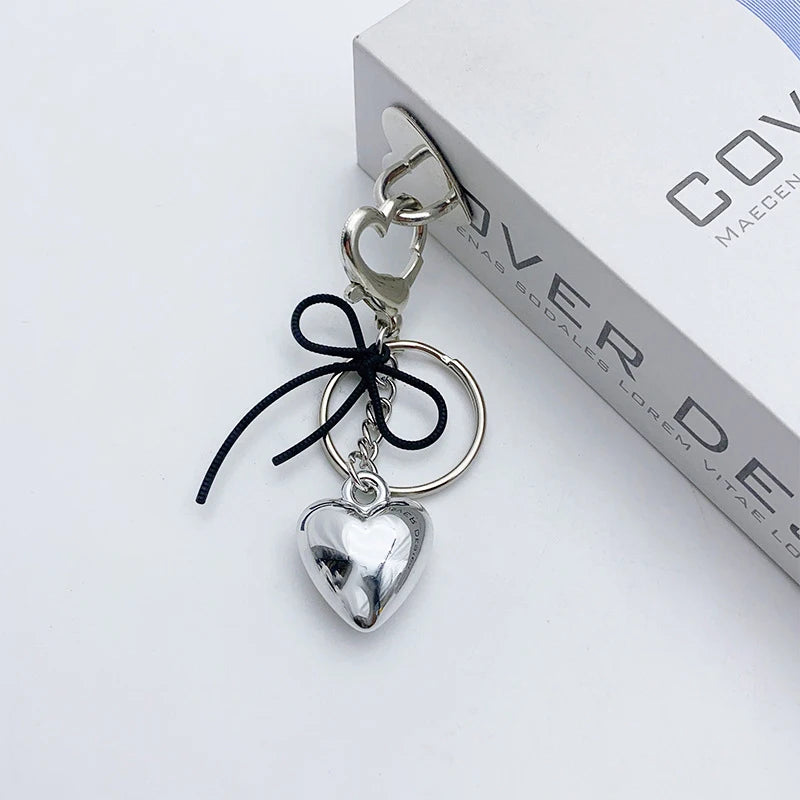 Y2K Silver Bowknot Heart Keychain – Metal Keyring & Bag Charm