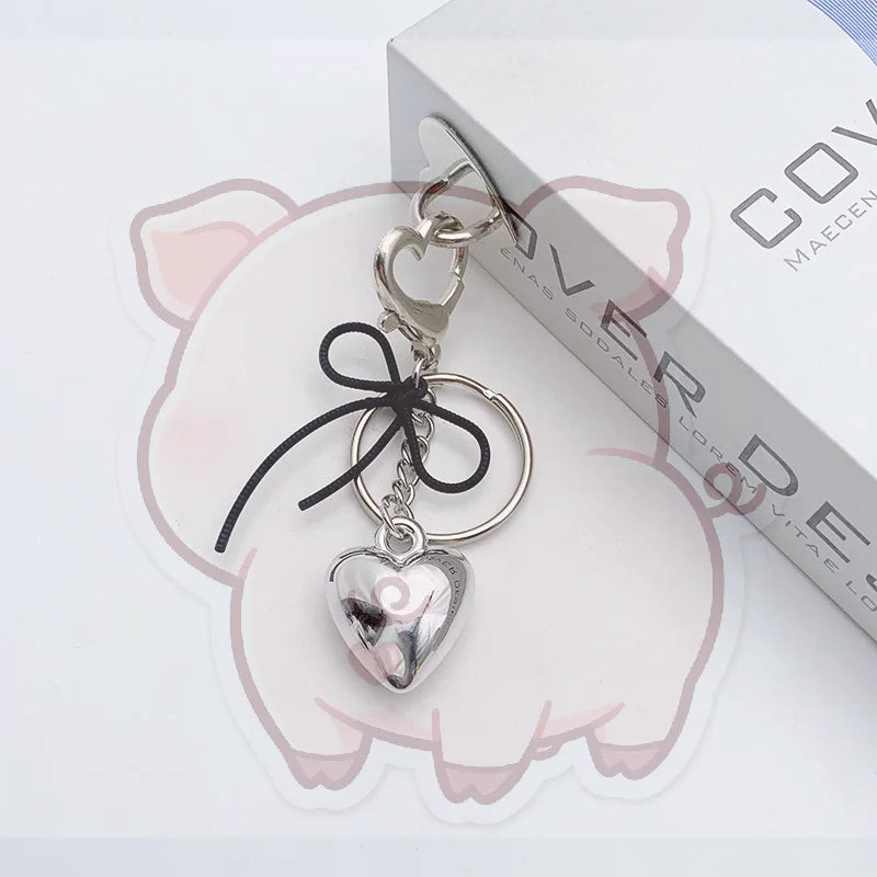 Y2K Silver Bowknot Heart Keychain – Metal Keyring & Bag Charm